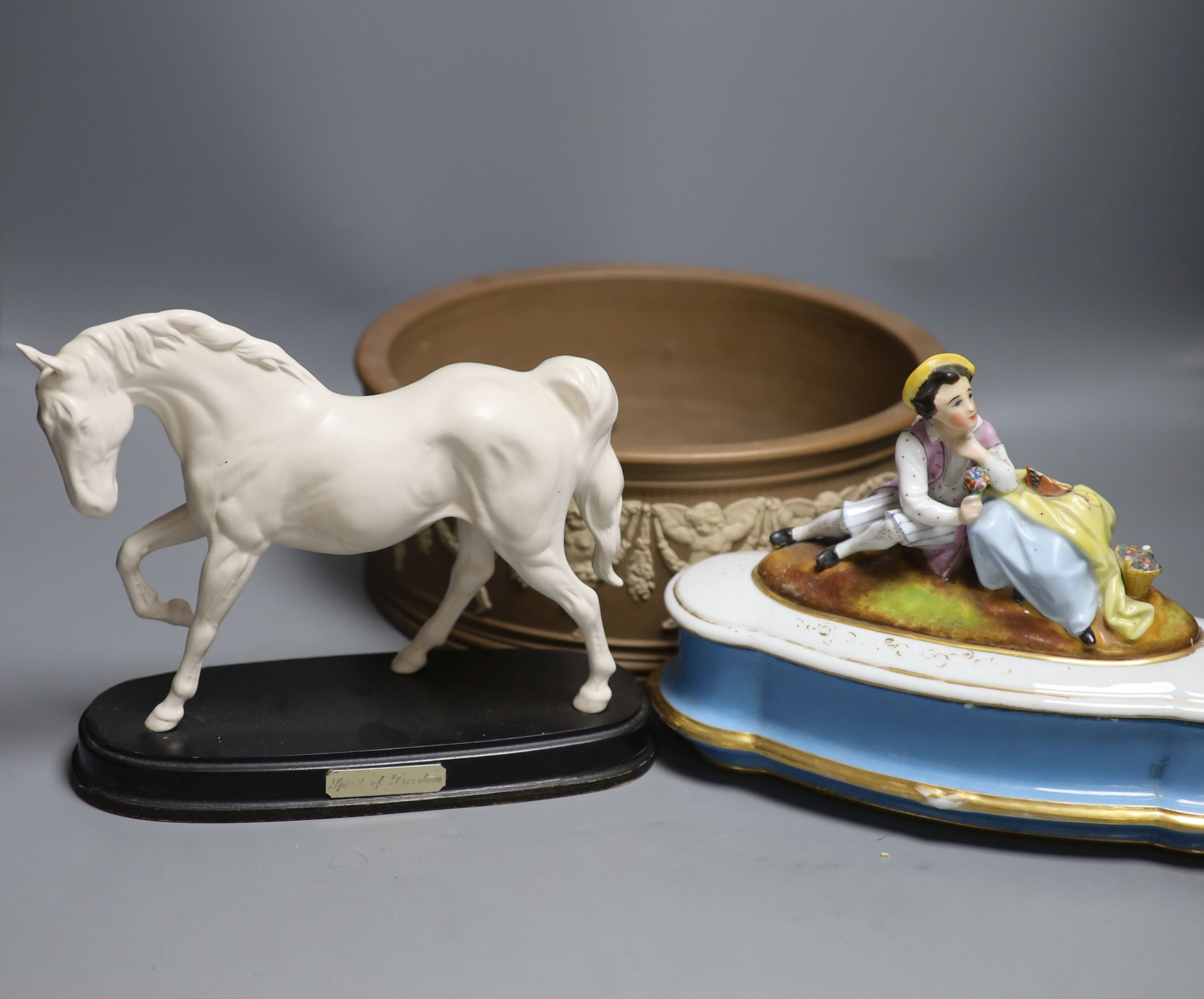 A Doulton silicon Lambeth planter, A Royal Doulton ‘Spirit of Freedom’ horse and a figural porcelain casket